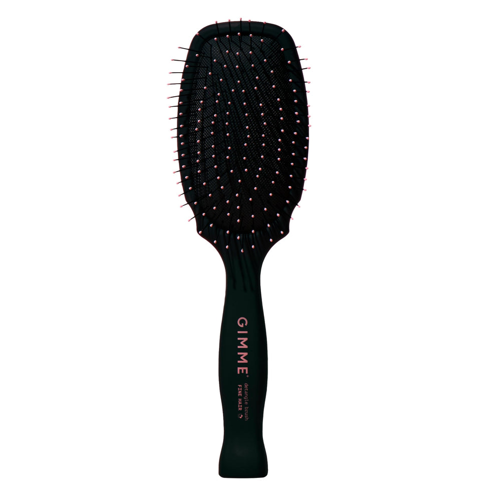 GIMME Beauty Detangling Brush paddle closeup showing smooth detangling for fine hair.