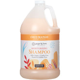 Ginger Lily Farms Botanicals Coco Mango shampoo pour demonstrates luxurious hydration for all hair types.