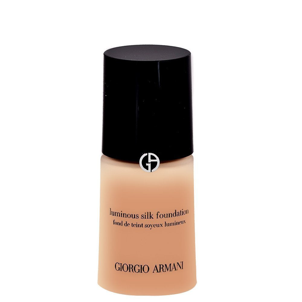 Giorgio Armani Luminous Silk Foundation No. 5.5 bottle closeup shows satin glow for natural radiance.
