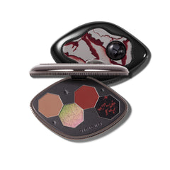 GIRLCULT eyeshadow quad compact mirror for precise on-the-go application.