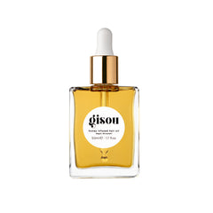 Gisou Honey Infused Hair Oil bottle close-up for instant shine and luxury hydration.