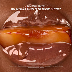 Gisou Honey Infused Lip Oil worn alone or layered to boost glow