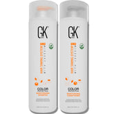 GK HAIR moisturizing shampoo bottle pours for gentle sulfate-free cleansing for color-treated hair