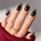 Glamnetic Dementor nails in medium almond with smoky gradient tips for chic, dramatic style.