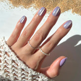 Glamnetic Mermaid's Tail nails show iridescent purple velvet finish for durable summer glam