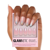 Glamnetic Winter Storm short almond nails with holographic shimmer offer a chic semi-transparent look.