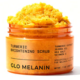 Glo Melanin Turmeric Scrub jar closeup promotes radiant skin and gentle exfoliation