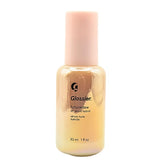 Glossier Futuredew bottle closeup reveals a luminous glow after application.