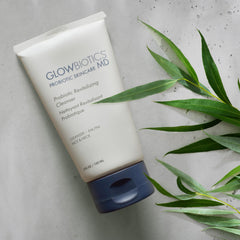Glowbiotics Probiotic Revitalizing Cleanser foam texture suggesting gentle cleansing