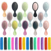 Goiio mini hair brush with soft cushion teeth for gentle detangling on the go.
