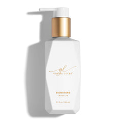 Goldie Locks Signature Leave-In Conditioner bottle closeup offering quick detangling and frizz control.
