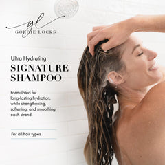 Goldie Locks travel-size bottle close-up shows creamy foam for frizz control.