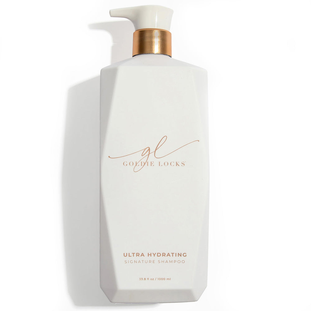 Goldie Locks Ultra Hydrating Shampoo bottle pour demonstrates gentle cleanse for color-treated hair