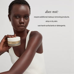 Goop Beauty Cleansing Balm jar during application demonstrates melt-into-oil texture.