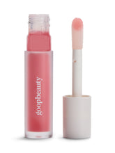 goop Hydra-Barrier Gel Gloss bottle close-up shows premium lip-care packaging for on-the-go hydration