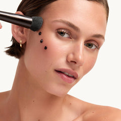 goop Summertone Bronzing Gel swatch on bare skin shows natural finish.