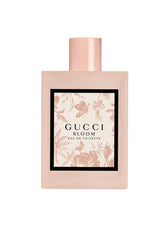 Gucci Bloom EDT spray outer bottle showing daytime-ready floral allure.