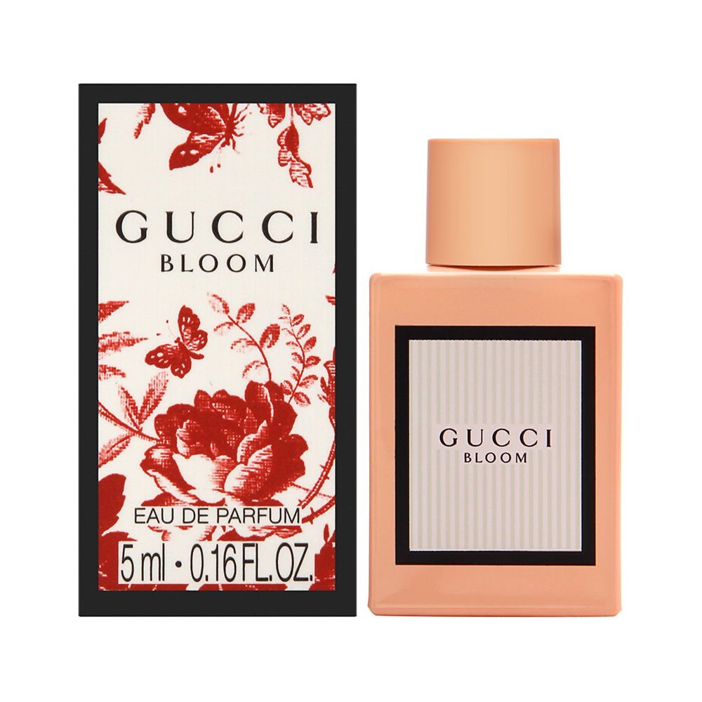 Gucci Bloom mini EDP bottle close-up, highlighting elegant packaging suitable for gifting