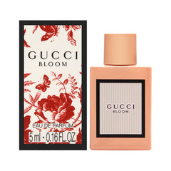 Gucci Bloom mini EDP bottle close-up, highlighting elegant packaging suitable for gifting