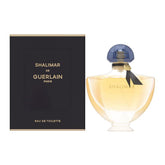 Guerlain Shalimar bottle pour—classic elegance for romantic evenings and daily wear.