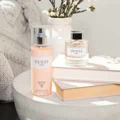 GUESS 1981 spray action demonstrates easy even application for daily use