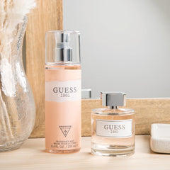 GUESS 1981 for Women fragrance mist with rose jasmine pear notes—subtle daytime fragrance.