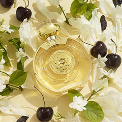 Close-up of GUESS Bella Vita bottle highlighting luxe design.