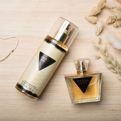 Guess Seductive fragrance mist bottle side view shows compact size for easy on-the-go use.