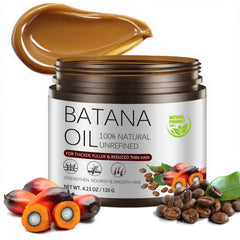 Gulizzmonis Batana Oil bottle close-up, premium cold-pressed formula for hair nourishment