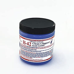 H-42 Clean Clippers Blade Cleaner spray application demonstrates quick disinfection between grooming sessions