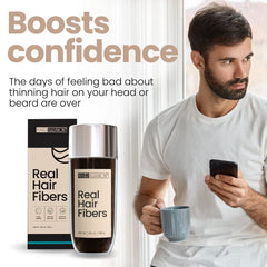 Hair Illusion application close-up blending fibers with existing hair.
