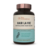 Hair La Vie Revitalizing Blend bottle front for daily hair health support.
