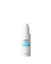 Hairstory Hair Balm bottle pour demonstrates moisture for all hair types and effortless smoothing