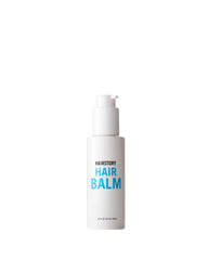Hairstory Hair Balm bottle pour demonstrates moisture for all hair types and effortless smoothing