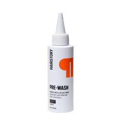 Hairstory Pre-Wash bottle pour demonstrates a gentle buildup-removing cleanse