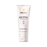 HAIRtamin Biotin Shampoo bottle shows sulfate-free, vitamin-rich formula for healthy strands