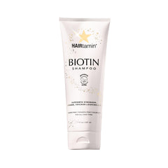 HAIRtamin Biotin Shampoo bottle shows sulfate-free, vitamin-rich formula for healthy strands