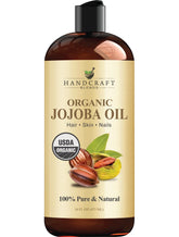 Handcraft Blends Jojoba Oil bottle close-up, pure and fast-absorbing moisturizer.