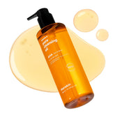 Hanskin AHA Pore Cleansing Oil pump-action bottle for smooth makeup removal and hydration.
