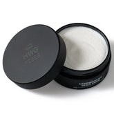 Hardworking Gentlemen pomade jar close-up for matte finish styling versatility.