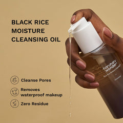 HARUHARU Wonder Black Rice oil drop close-up shows silky cleansing texture.