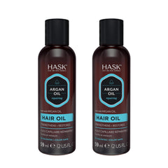HASK Argan Repairing Hair Oil on dry hair reveals silky finish and frizz control.