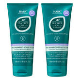 HASK Tea Tree Oil & Rosemary scrub bottle showing exfoliating action for a refreshed scalp