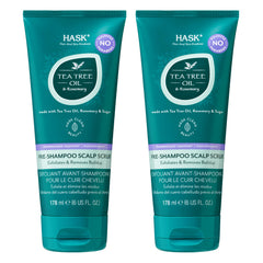 HASK Tea Tree Oil & Rosemary scrub bottle showing exfoliating action for a refreshed scalp