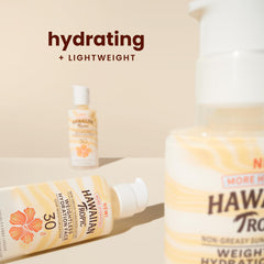 Hawaiian Tropic travel-size bottle ready for beach or travel