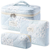 HBselect quilted makeup bag with floral pattern; smooth cotton texture for daily organization.
