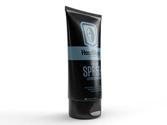 HeadBlade HeadLube SPF50 bottle angle highlights non-greasy, quick-absorbing sunscreen texture.