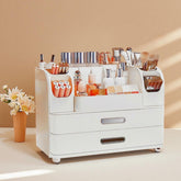 Heaime makeup organizer with drawers on vanity offers organized cosmetics storage.