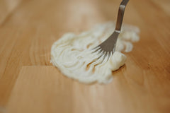 Hearth and Homestead balm texture closeup highlights whipped, melt-in moisture for everyday use.