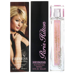 Heiress perfume application shot highlighting easy spray for casual outings.